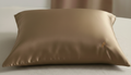 Our interior designer suggests brown cushions to match warm or dark colours.